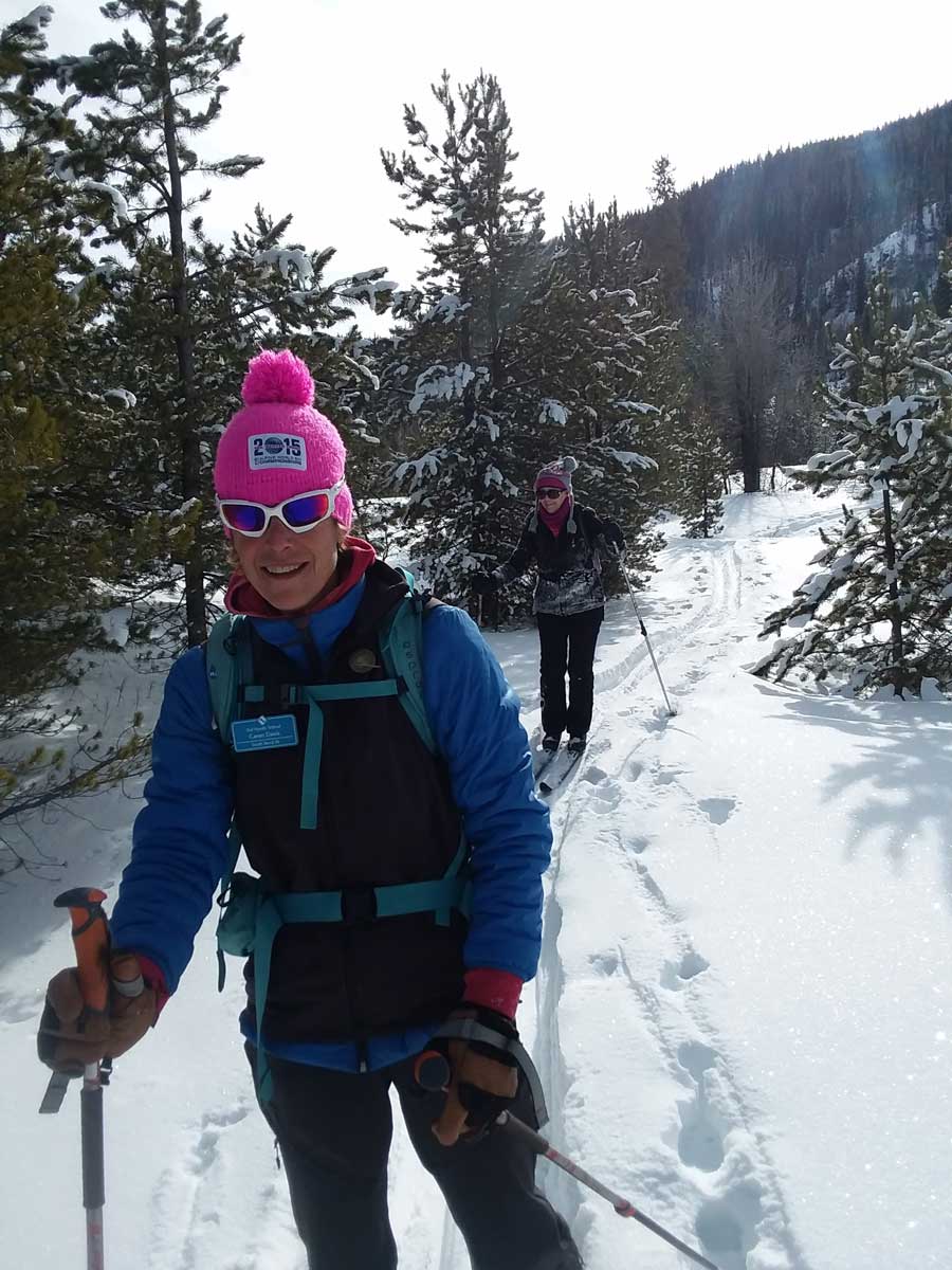 Two nordic skiers on the trails at Vail Nordic School