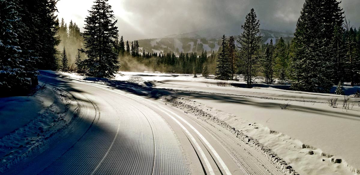 Sunrise over the snow-covered trails